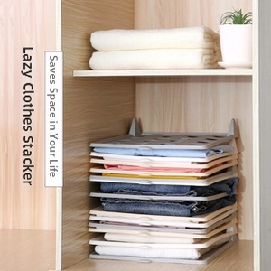 Macro detail of gray stackable clothes organizers for maximizing closet storage space