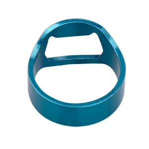 Detail view of the blue stainless steel bottle opener ring with smooth metallic finish