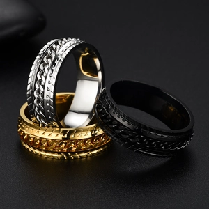 Wide stainless steel spinner rings with tire chain pattern in silver, gold, and black finish