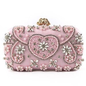 Exquisite pink satin clutch with handmade pearl heart pattern and gold flower clasp