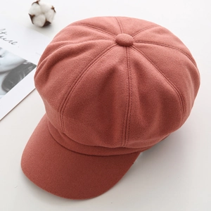 Classic burnt orange wool newsboy cap for women featuring a minimalist octagonal design
