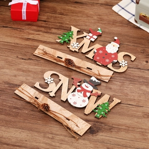 Wooden Xmas and Snow tabletop signs with Santa and snowman on dark wood background