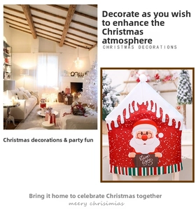Detail of Christmas chair cover with Santa Claus illustration and Warm Wishes sign