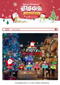 Detail of Christmas window sticker set with Santa Claus driving a gift train and snowflakes