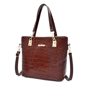 Dark brown faux crocodile leather handbag for women with gold hardware and shoulder strap