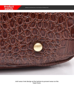 Detail of dark brown crocodile texture leather and golden protective base rivet