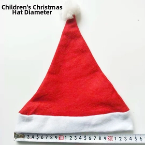 Flat lay of a red felt children's Christmas hat with ruler showing 26cm diameter