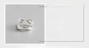Detail showing S925 sterling silver X-shaped cross ring with size and weight specs