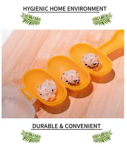 Close-up of three-hole DIY rice ball mold in yellow plastic for kids' kitchen meals