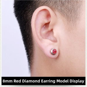 Detail shot of 8mm red rhinestone magnetic earring worn on ear without piercing
