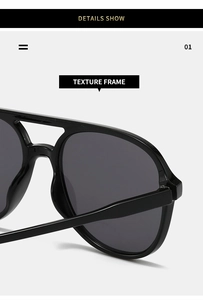 Detail show of premium glossy black double-bridge frame on oval aviator sunglasses