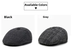 Détail de casquettes gavroche classiques à carreaux noirs et gris en laine
