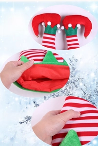 Detail of elf hat featuring festive jingle bells on legs and soft cotton padding
