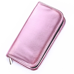 Detailed view of a pink metallic PU leather makeup brush case with a silver zipper