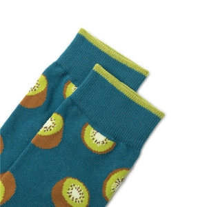 Close-up of teal crew socks showing ribbed cuffs and knitted kiwi fruit patterns