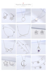 Collection of S925 sterling silver jewelry including clover, star and moon designs