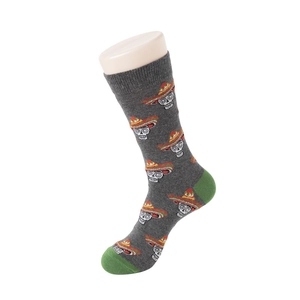 Detail of dark grey mid-calf socks with Mexican skull print and green reinforced toes