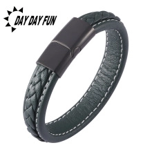 Detail of dark gray braided leather bracelet with white stitching and matte black magnetic clasp