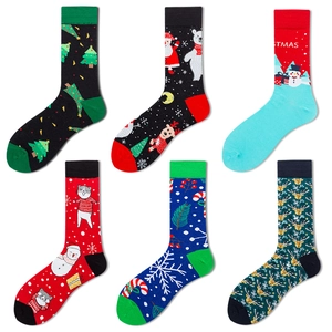Set of six festive Christmas socks with Santa and reindeer patterns in multiple colors