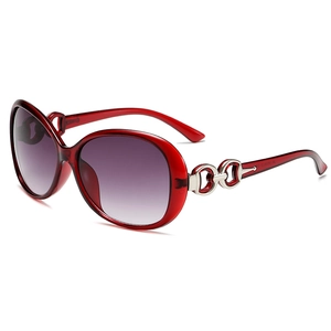 Oversized oval sunglasses with dark red transparent frames and purple gradient lenses