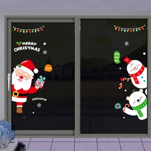 Christmas window stickers featuring Santa, snowman, and polar bear on glass doors