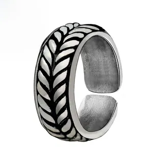 Macro shot of punk skull ring with wheat textures and vintage oxidized silver finish