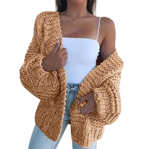 Detail of chunky knit caramel mohair cardigan showing texture and loose fit style