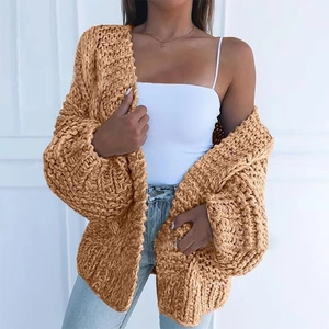 Thick khaki mohair cardigan with chunky knit texture and oversized dropped shoulder design