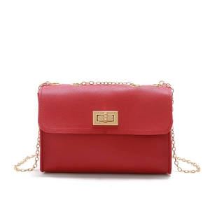Detail of red PU leather mini crossbody bag featuring a gold metal lock and chain strap