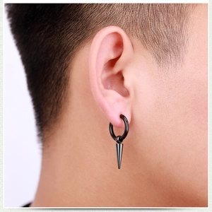 Men's punk black stainless steel hoop earring with cone spike pendant worn by model