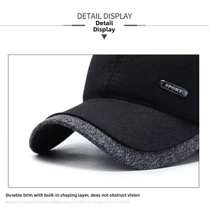 Close-up of wool baseball cap with SPORT metal tag and reinforced brim stitching