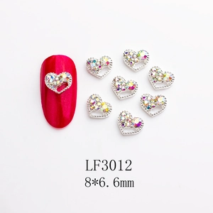 Close-up of heart nail charm with silver frame and AB rhinestones, size 8x6.6mm