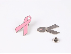 Detail of pink ribbon enamel brooch showing front finish and butterfly clasp back