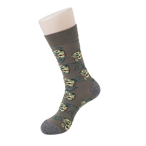 Detail view of khaki crew socks with dollar bill pattern on a plastic leg mannequin