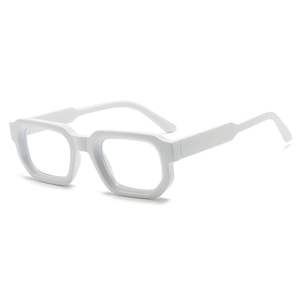 Macro side view of white chunky square frames and thick temples of retro glasses