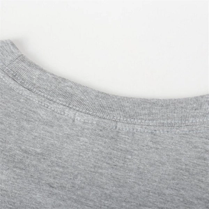 Detailed view of the grey sleeveless top's ribbed crew neck and durable double stitching