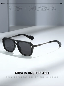 Detail of classic metal aviator sunglasses with high-quality hinges and dark grey lenses
