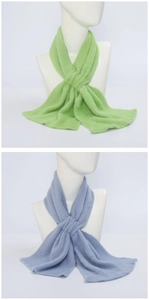 Detailed comparison of grass green and light blue thick scarves on a mannequin