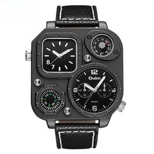 Detail view of Oulm multi-timezone watch with large black dial and leather strap
