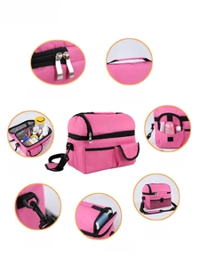 Detail view of pink insulated bag with reinforced zippers and adjustable shoulder strap