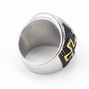 Retro men's stainless steel cross ring with gold cross on black textured base