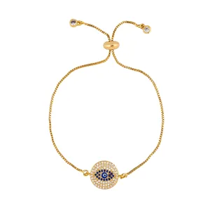 Adjustable gold evil eye bracelet with blue center and sparkling white zircon pavé setting