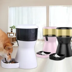 Detail of smart pet feeders in white pink and black with mobile app camera function