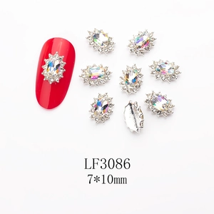 Macro detail of K9 crystal nail charm with silver micro-beads, size 7x10mm, item LF3086