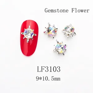 Macro shot of silver alloy rhinestone nail charm LF3103 in floral shape, 9x10.5mm size