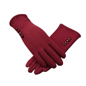 Elegant burgundy knit gloves for women featuring a four-button detail and touchscreen tips