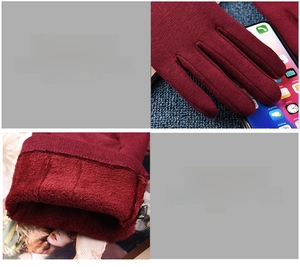 Detail view of burgundy fleece-lined winter gloves with reinforced stitching and thermal fabric