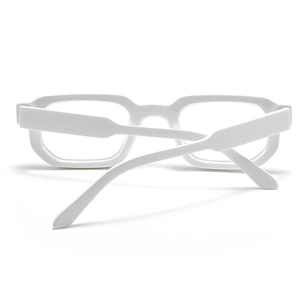 Close-up of white rectangular sunglasses with thick frames and wide trapezoidal temples
