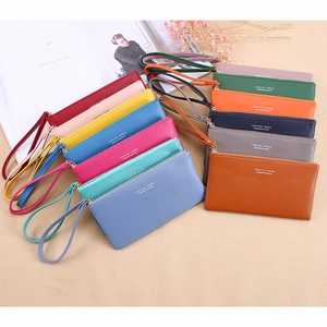 Long faux leather zipper wallet in multiple colors with wrist strap for women