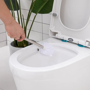 Scopino per WC in acciaio inossidabile utilizzato in bagno moderno con setole bianche